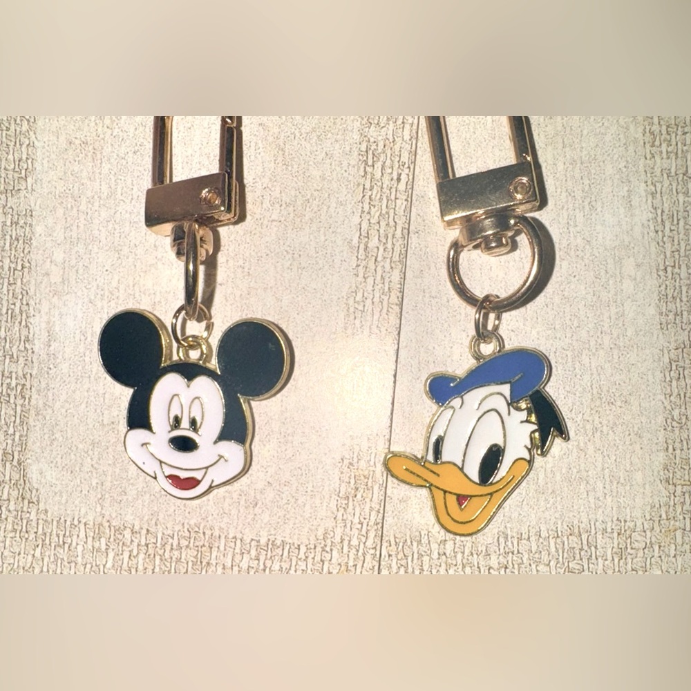 Mickey and Donald Duck charms